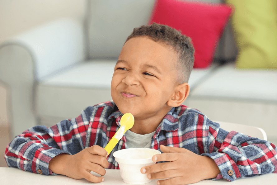 Little boy eating a nut-free snack