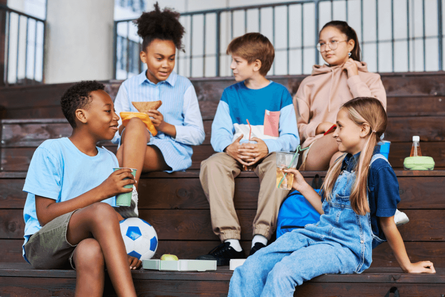 kids enjoying snacks during lunch