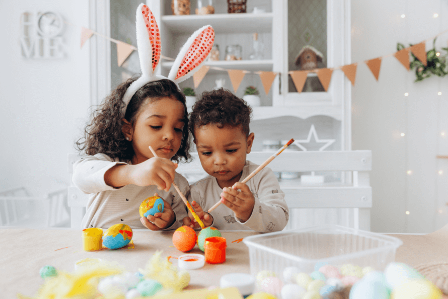 kids painting Easter eggs