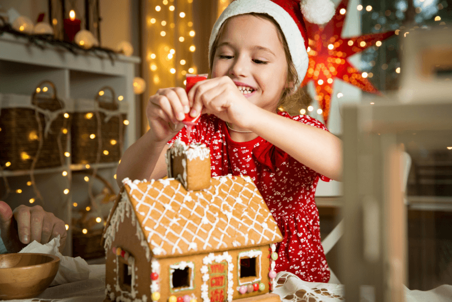 Girl making a winter gingerbread snack